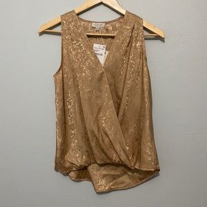 Gold shimmer sleeveless blouse